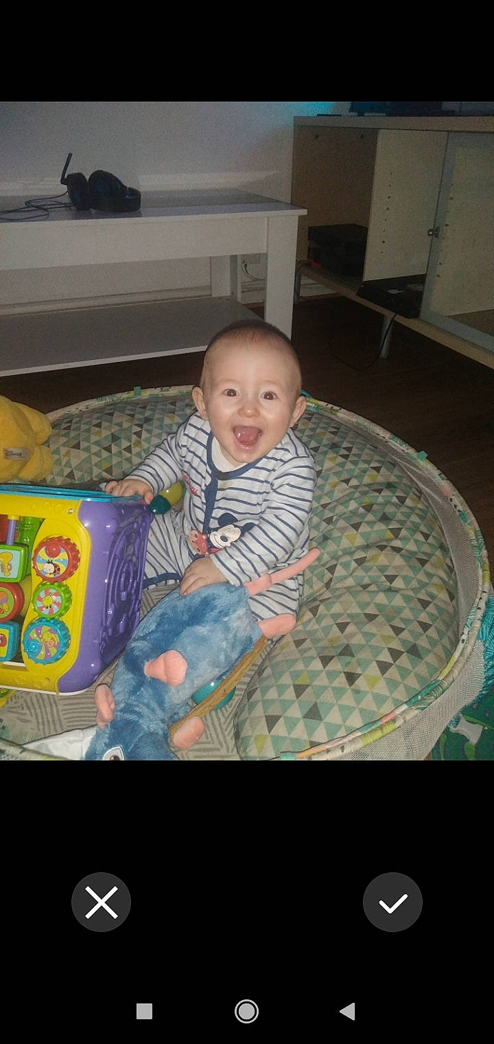 Léo Tony a rejoint le concours — aidez-le/la à gagner de superbes lots ! baby, baby_products, baby_toddler_clothing, baby_toys, chair, child, comfort, drawer, electronic_device, flooring, fun, hairstyle, hardwood, person, play, product, room, sitting, smile, toddler