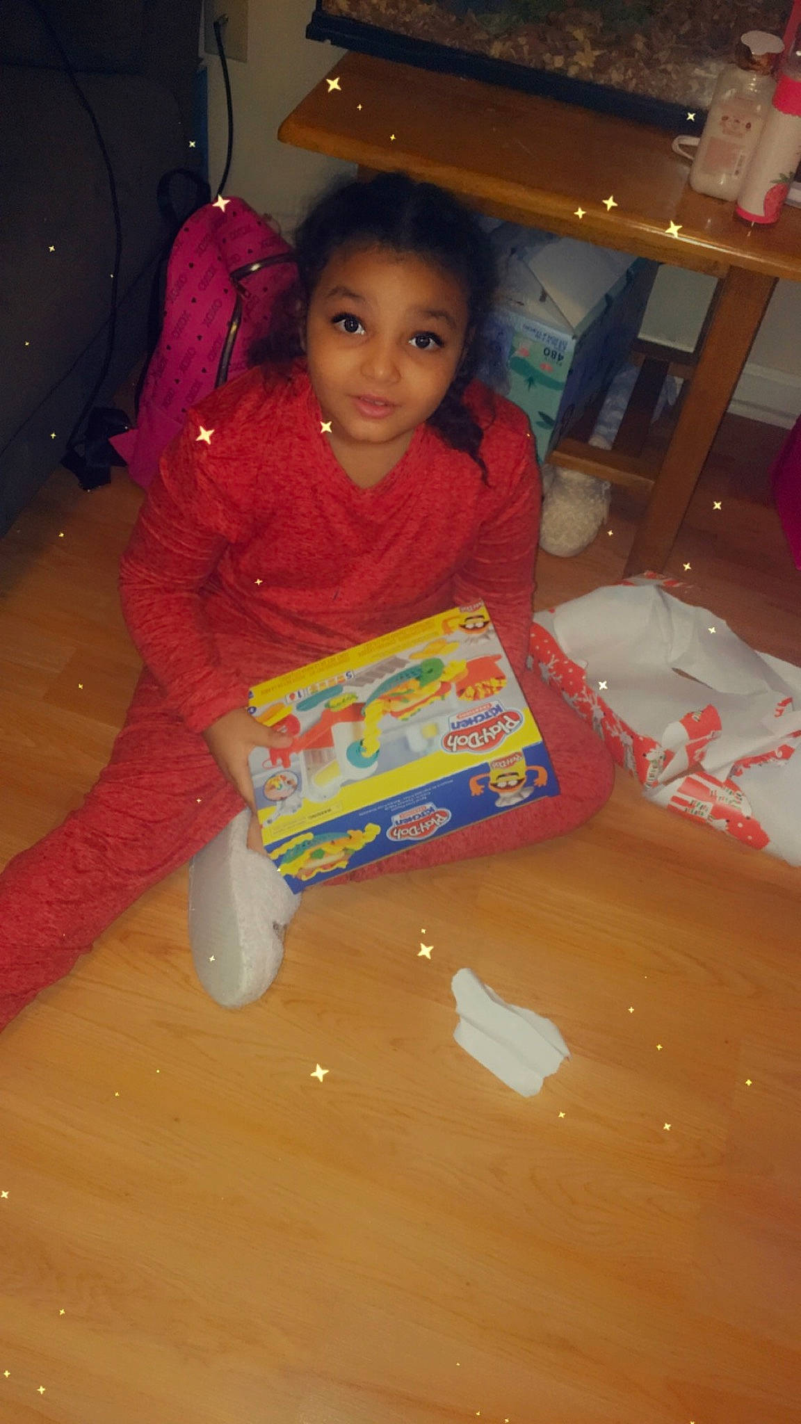 Jayliana is registered to the contest to win money with this photo: baby, baby_toddler_clothing, child, flooring, fun, houseplant, party, person, play, room, sitting, sleeve, smile, t_shirt, toddler