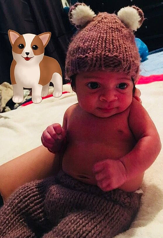Diego is registered to the contest to win money with this photo: cap, cat, child, crochet, ear, fur, girl, hair_accessory, head, headgear, infant, knitting, person, product, textile, toddler