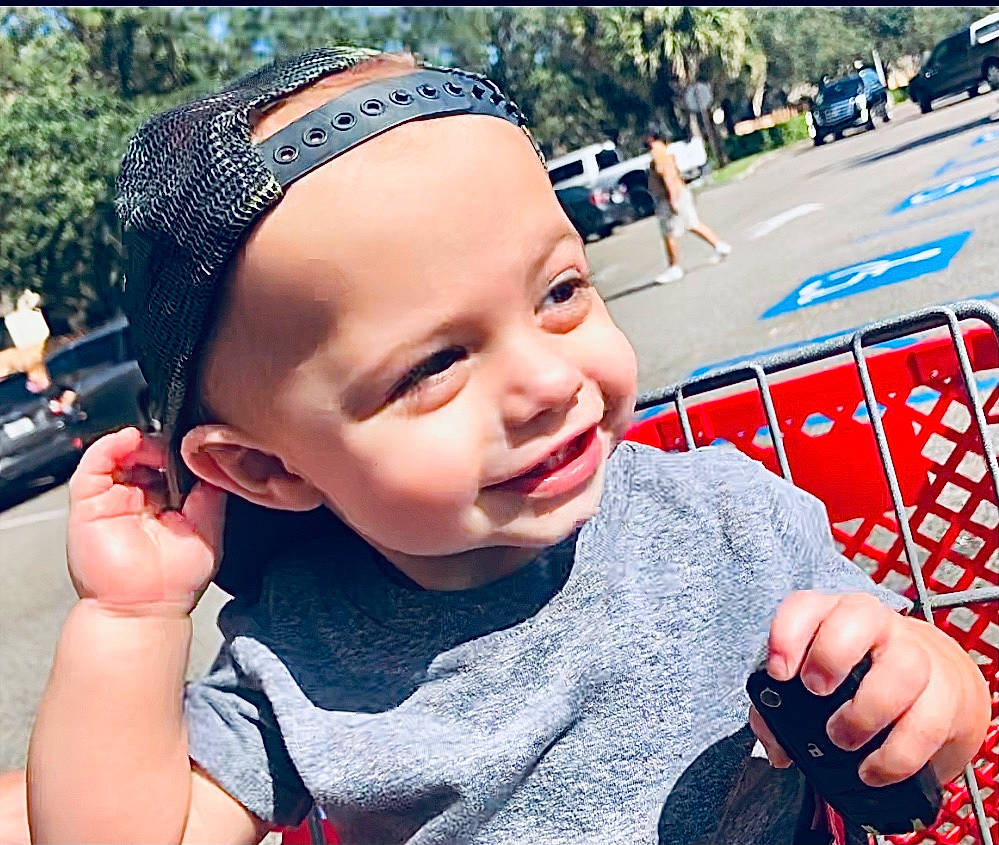 Conway joined the competition — help win amazing prizes! baby, cap, child, cool, electric_blue, face, finger, fun, gesture, grass, hand, happy, headwear, joy, leisure, people, person, recreation, smile, summer