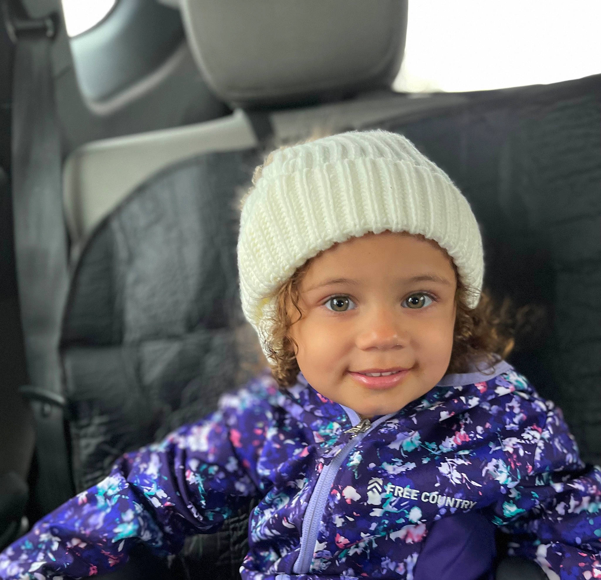 Xiomara joined the competition — help win amazing prizes! cap, child, cool, eye, face, fashion, fun, happy, head, headgear, headwear, joy, outerwear, person, photograph, purple, smile, snapshot, street_fashion, textile