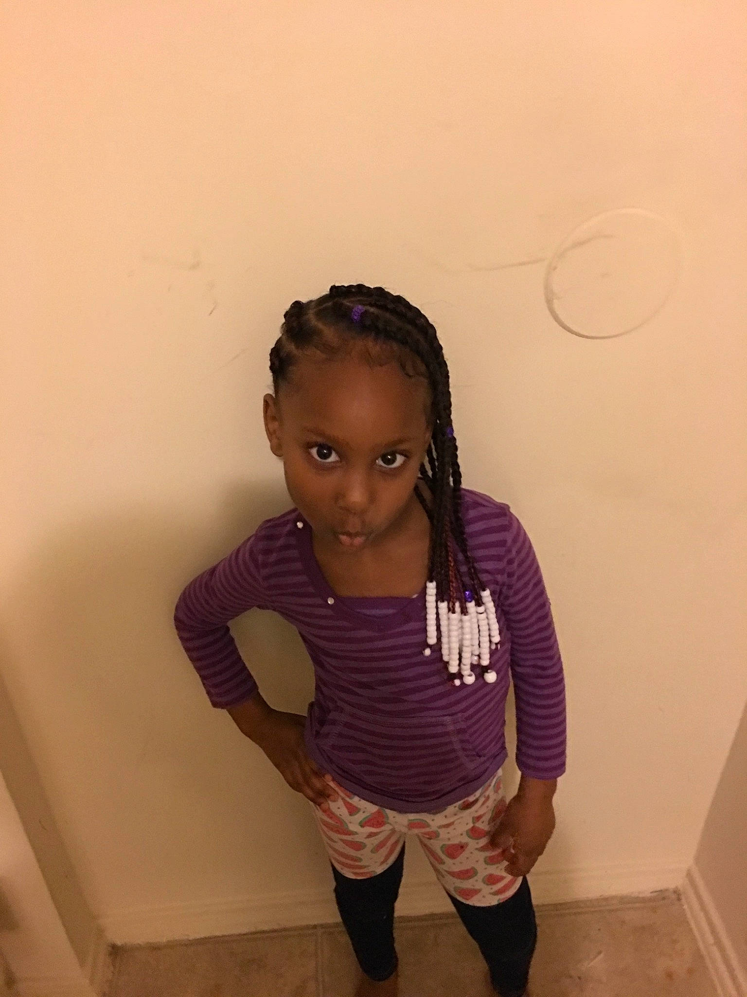 Jyani is registered to the contest to win money with this photo: arm, child, joint, knee, neck, person, purple, standing, toddler