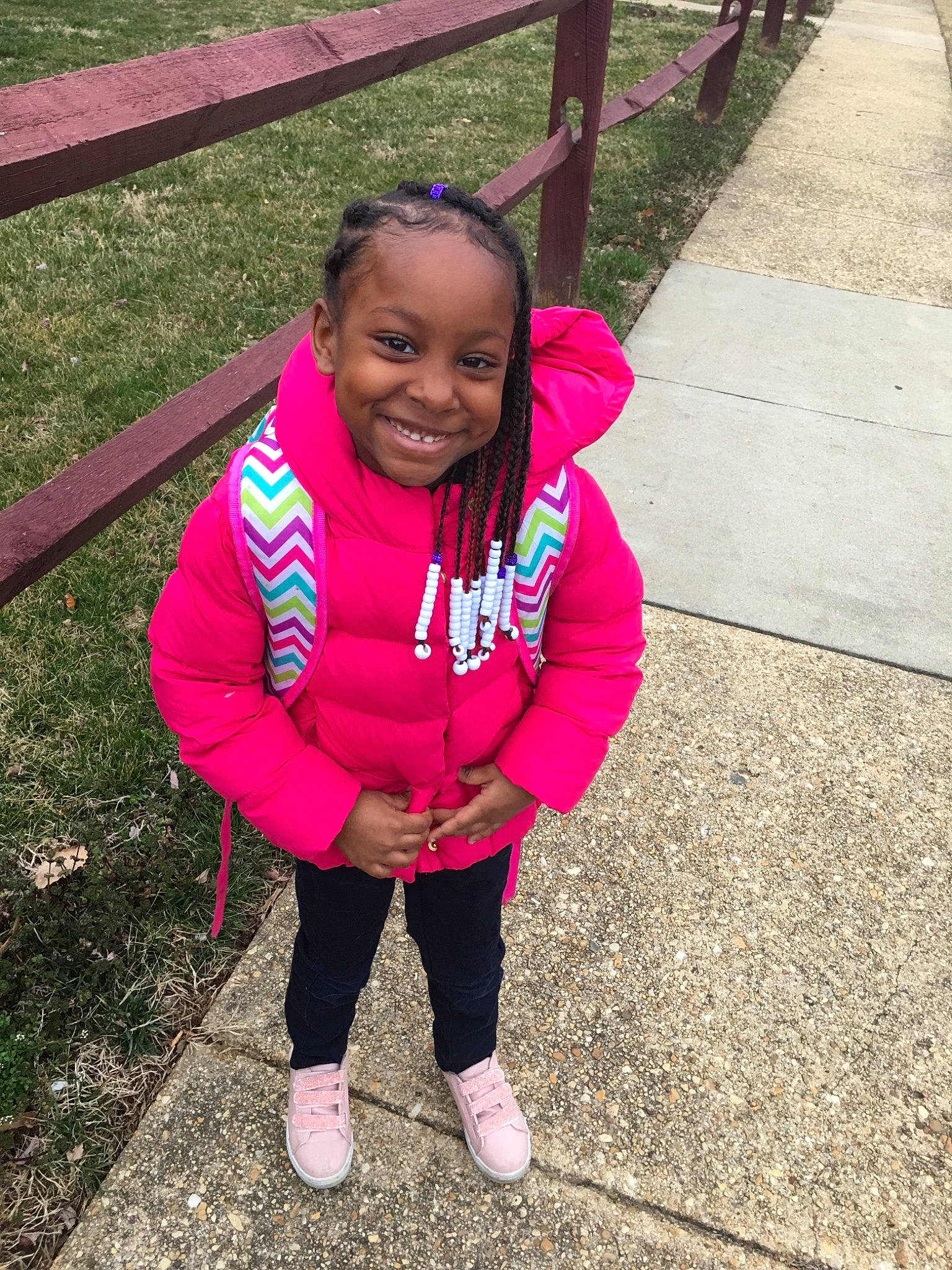 Jyani is registered to the contest to win money with this photo: child, face, facial_expression, flower, fun, happy, head, jacket, jeans, joy, leisure, magenta, outerwear, people, person, pink, plant, play, smile, toddler