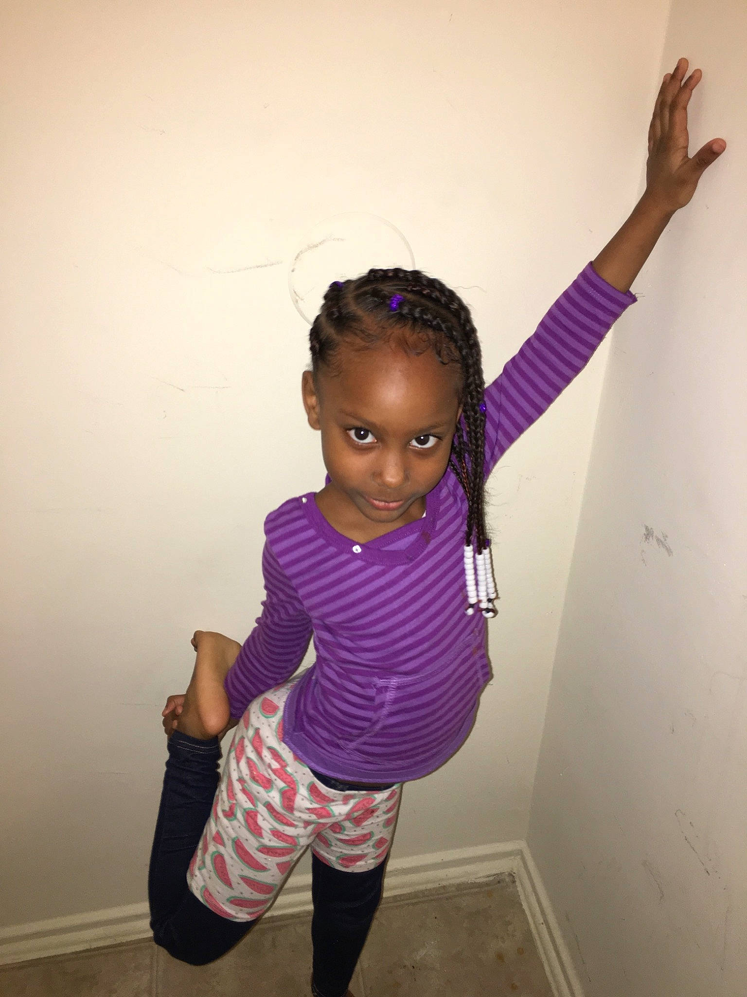 Jyani is registered to the contest to win money with this photo: arm, child, finger, fun, gesture, happy, joint, joy, knee, leg, leggings, person, pink, purple, shoulder, sleeve, smile, standing, t_shirt, tights