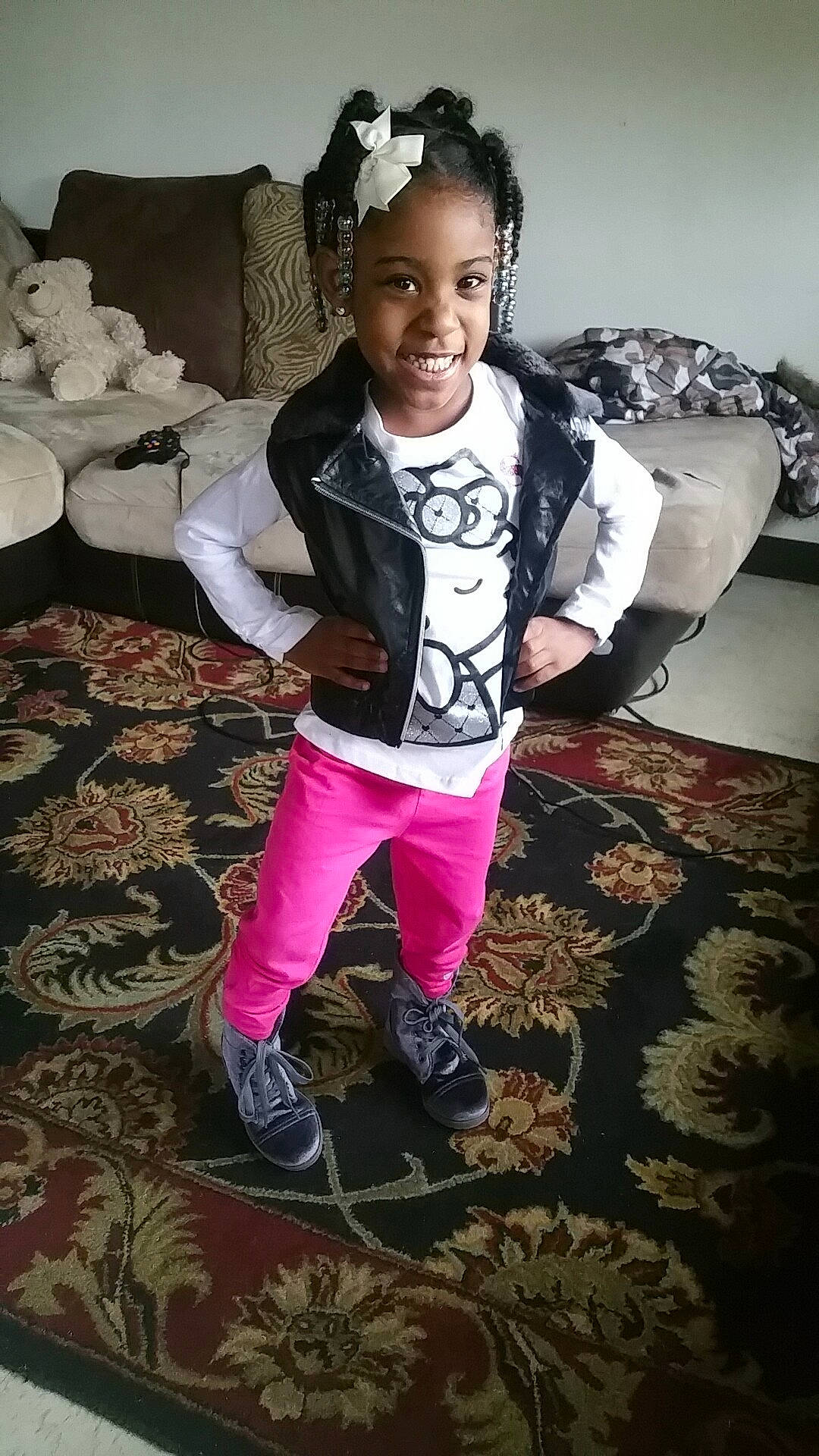 Izzy is registered to the contest to win money with this photo: child, cool, footwear, happy, joy, person, pink, shoe, smile, toddler