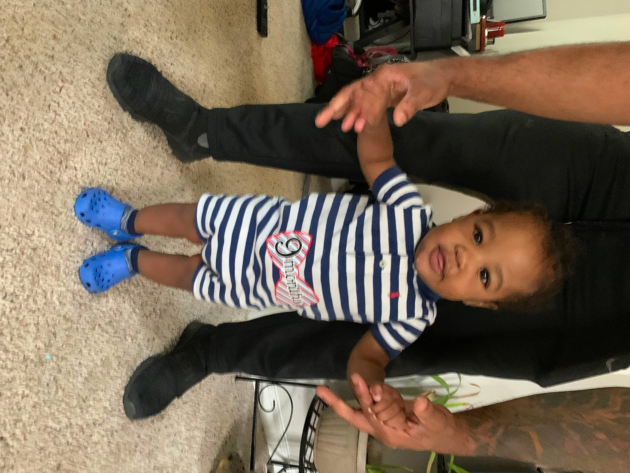 Michael Jr joined the competition — help win amazing prizes! baby_toddler_clothing, child, elbow, finger, flooring, foot, fun, human_leg, joint, knee, leg, person, shoe, sitting, sneakers, sock, thumb, toddler, walking_shoe, white