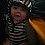 Kaycen joined the competition — help win amazing prizes! apparel, baby, black_and_white, blanket, cheeks, child, cozy, cute, face, happy, hood, indoors, infant, person, seated, smiling, soft, striped_clothing, warm, zebra_pattern