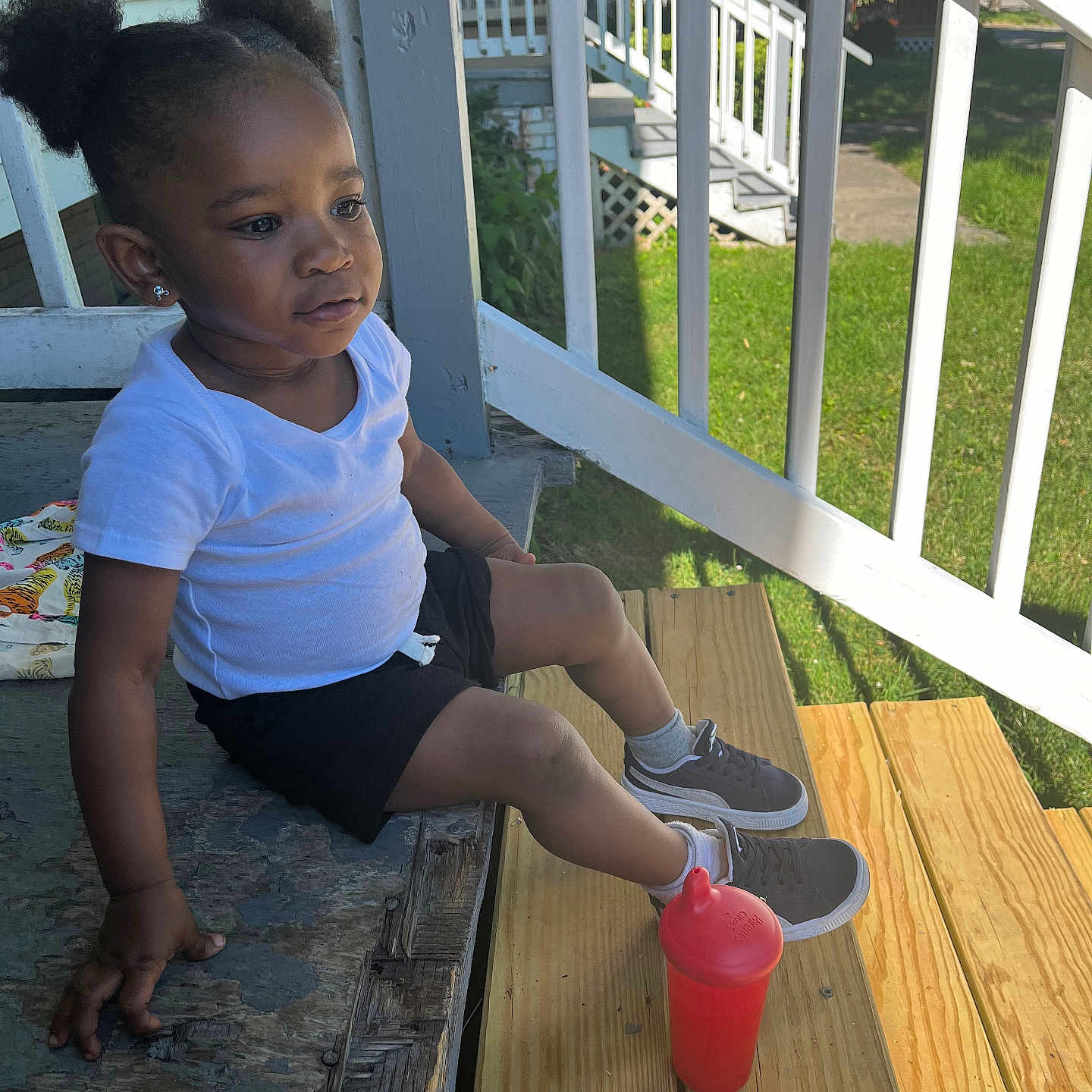 Alannah joined the competition — help win amazing prizes! architecture, building, child, clothing, deck, face, female, footwear, girl, head, house, housing, person, photography, plywood, porch, portrait, shoe, shorts, wood