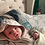 Remi joined the competition — help win amazing prizes! baby, bed, blanket, casual, child, clothing, comfort, cozy, cute, drool, face, hand, hoodie, indoors, infant, pillow, plush, portrait, relaxed, soft