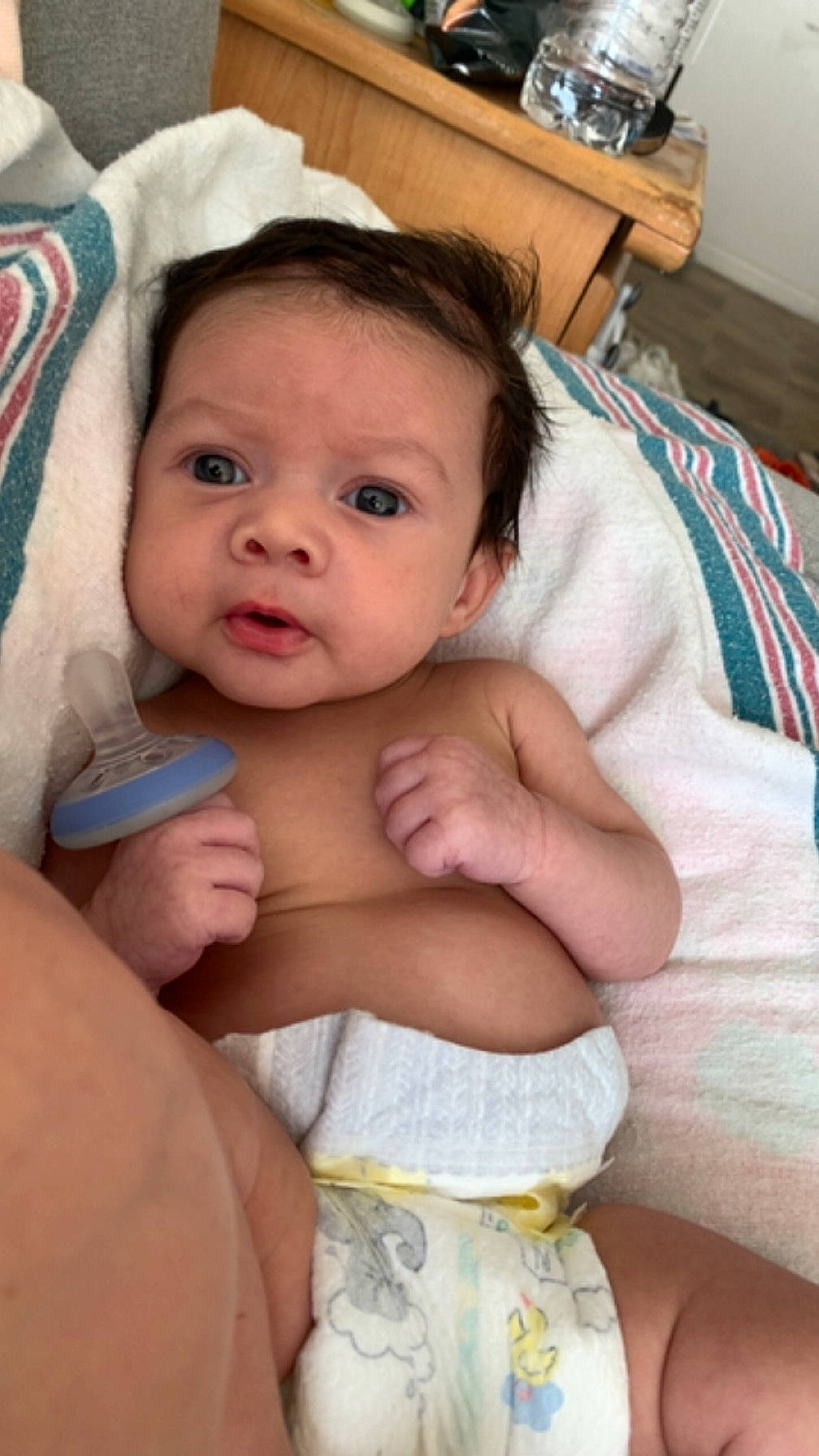 Asiyah is registered to the contest to win money with this photo: abdomen, arm, baby, cheek, chest, chin, comfort, eye, eyebrow, eyelash, finger, hand, head, lip, mouth, neck, person, skin, stomach, thumb