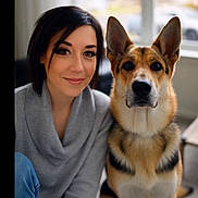 German Shepherd joined the competition — help win amazing prizes! animal, casual_clothing, companion, cozy, cute, dog, friendship, fur, german_shepherd, happy, home, indoor, long_hair, natural_light, pet, portrait, sitting, smiling, window, woman