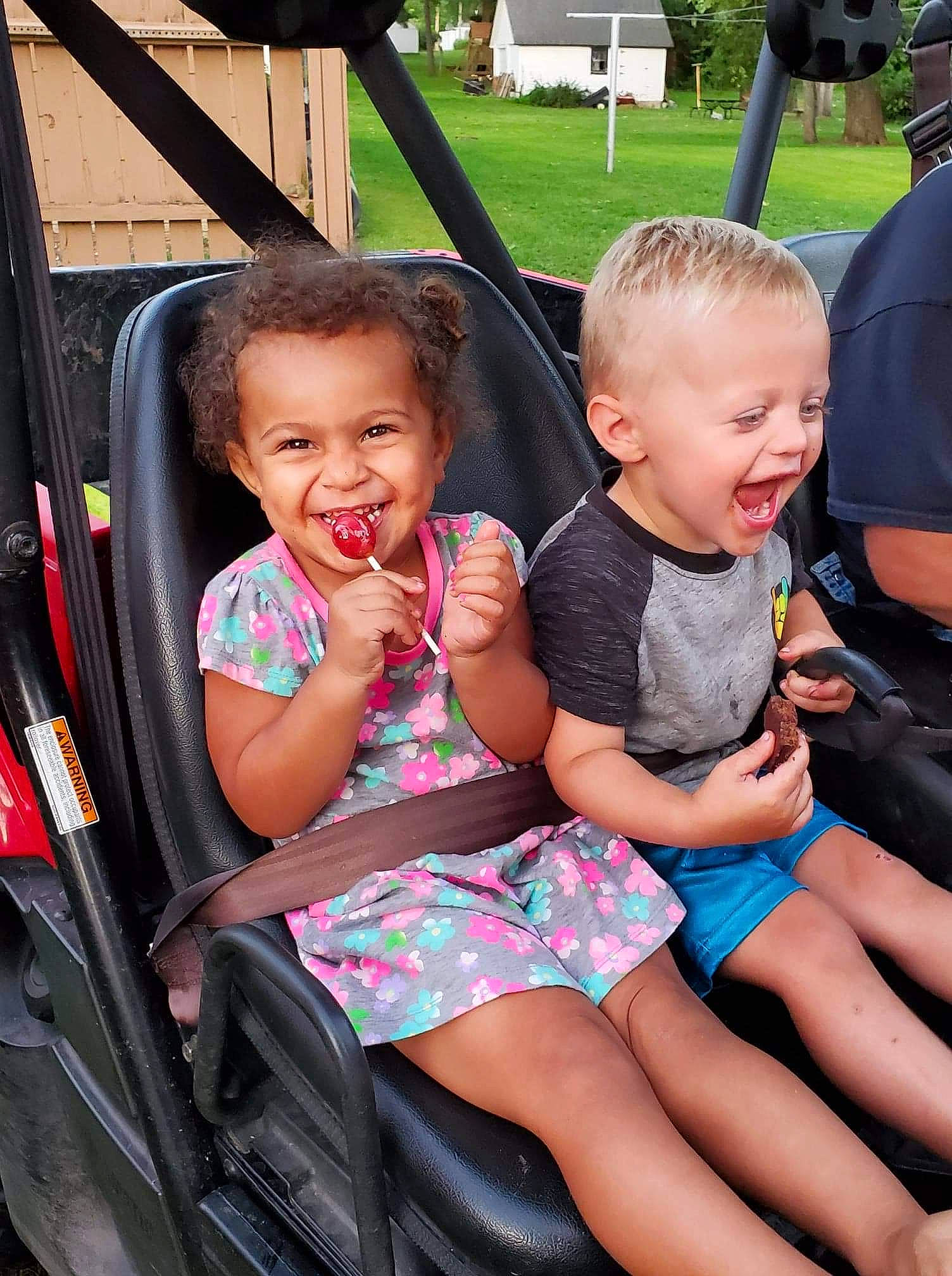 Ella joined the competition — help win amazing prizes! baby_products, car_seat, child, fun, happy, joy, leisure, person, playground, product, sitting, skin, smile, toddler, vacation