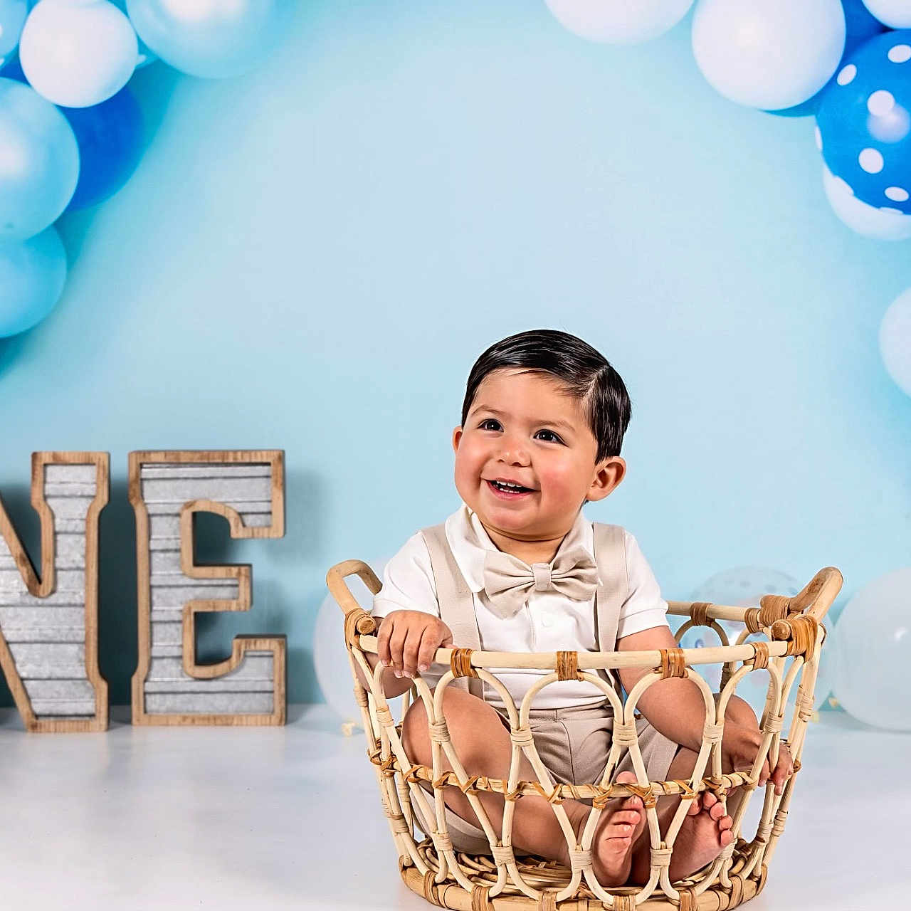 Brayden joined the competition — help win amazing prizes! baby, babylaughing, balloon, basket, face, festival, hanukkahmenorah, happy, head, laughing, people, person, photography, portrait, sitting, smile