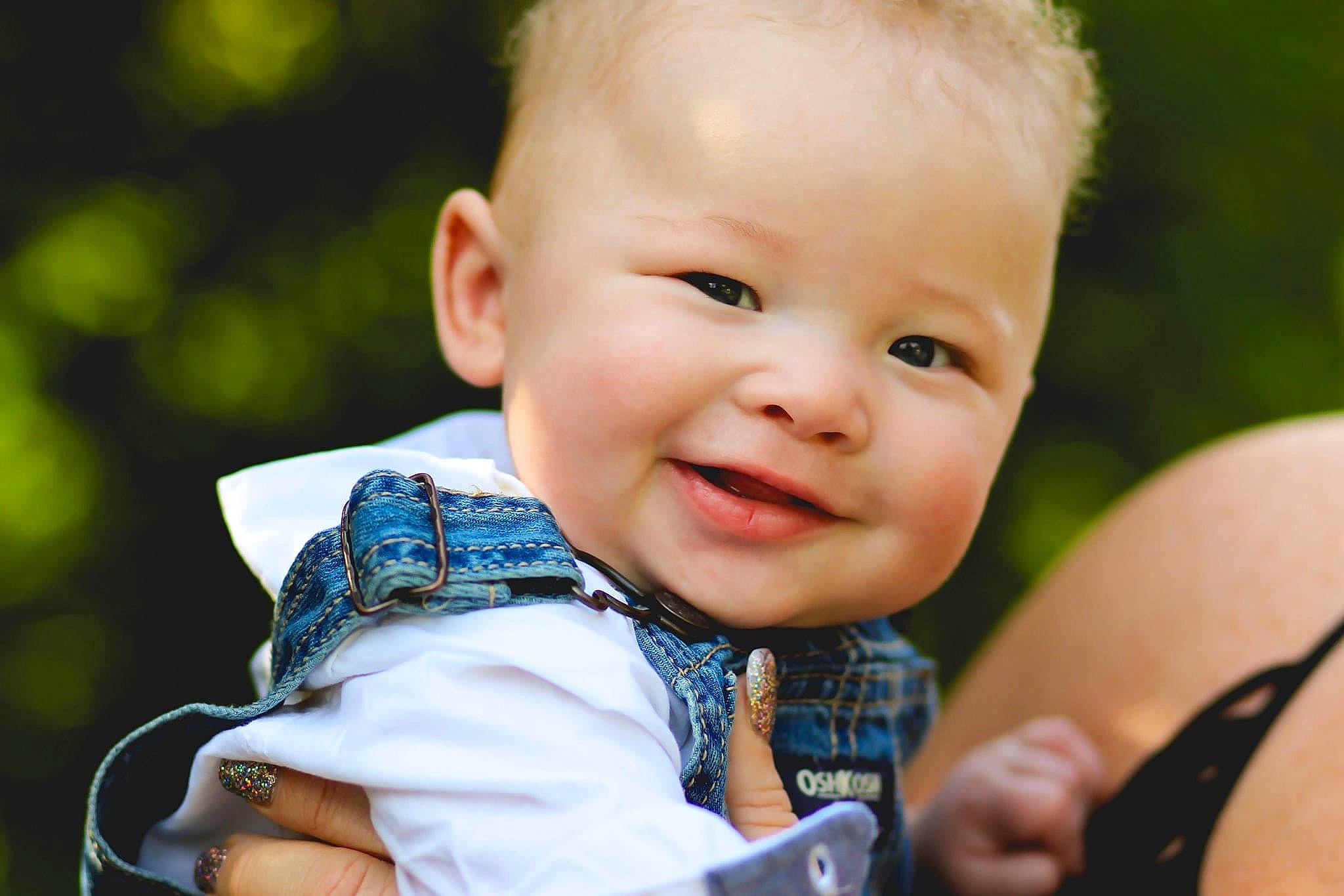 Justus joined the competition — help win amazing prizes! baby, cheek, child, eye, face, facial_expression, finger, grass, hand, happy, joy, nose, people, person, photography, plant, portrait_photography, product, skin, smile