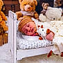 Sofia a rejoint le concours — aidez-le/la à gagner de superbes lots ! baby, sleeping, crib, plush_toy, giraffe, teddy_bear, blanket, head_wrap, white, wooden_furniture, nursery, soft_lighting, cozy, infant, cute, child, indoor, carpet, peaceful, decor