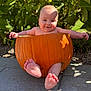Joey is registered to the contest to win money with this photo: baby, pumpkin, outdoor, smiling, happy, child, nature, greenery, feet, arms, face, sunlight, foliage, plant, autumn, cute, infant, playful, holiday, seasonal