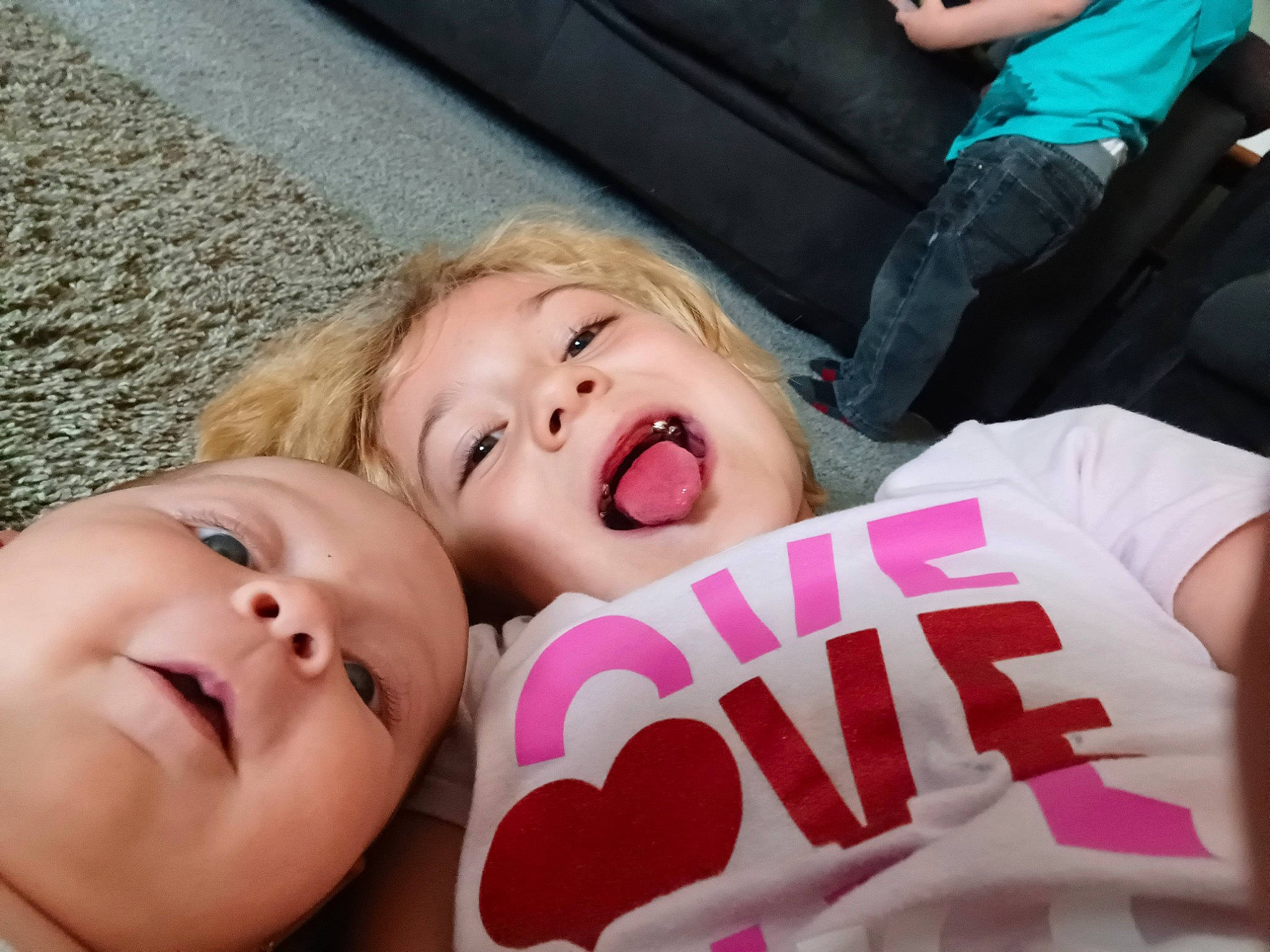 Anabella is registered to the contest to win money with this photo: baby, baby_toddler_clothing, cheek, child, chin, comfort, eye, eyebrow, finger, fun, grass, happy, head, lip, mouth, nose, person, pink, skin, smile