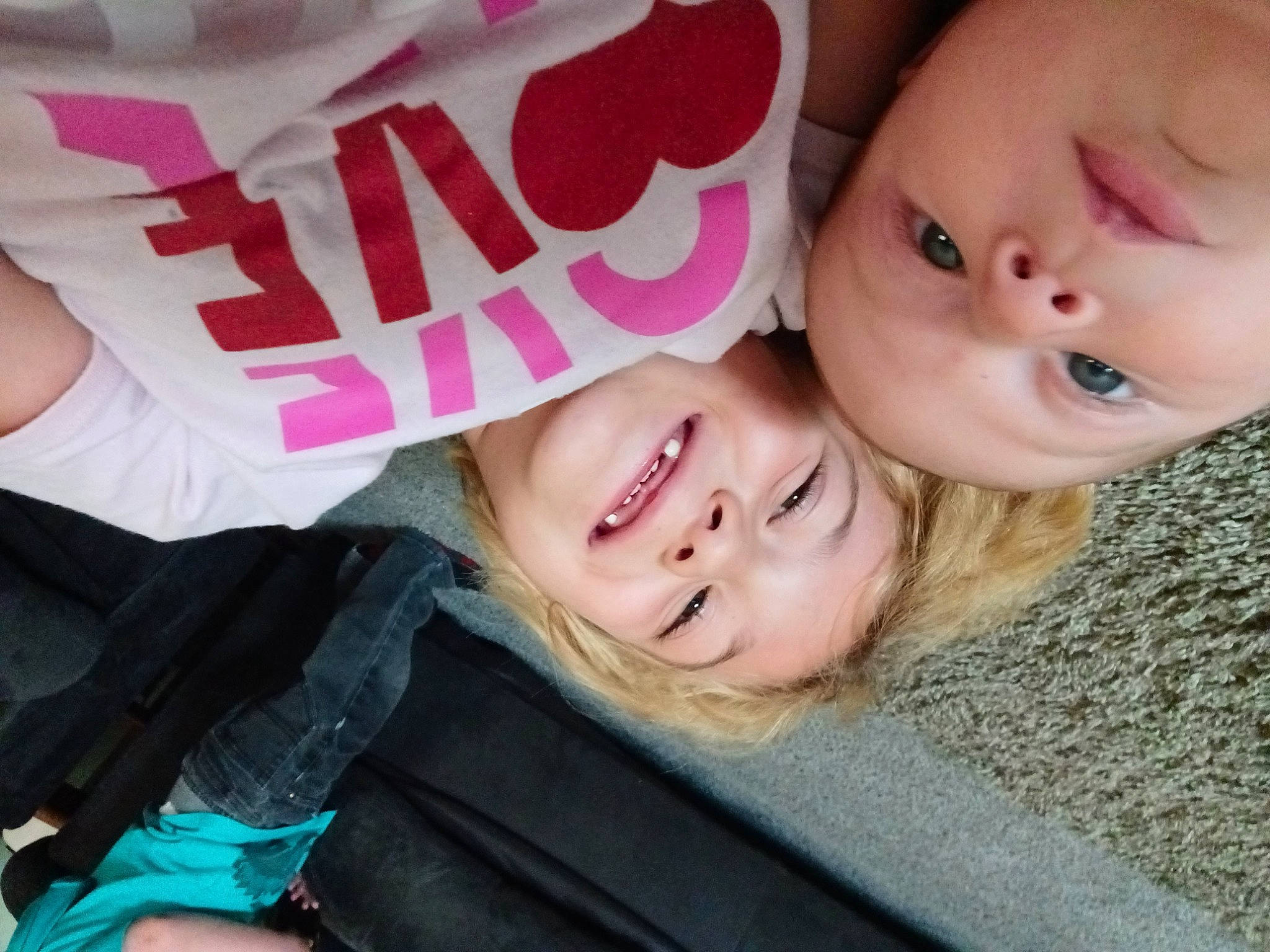 Anabella is registered to the contest to win money with this photo: baby_toddler_clothing, blond, cheek, comfort, eye, eyebrow, finger, fun, gesture, happy, human, joy, lip, nose, person, pink, product, skin, sleeve, smile