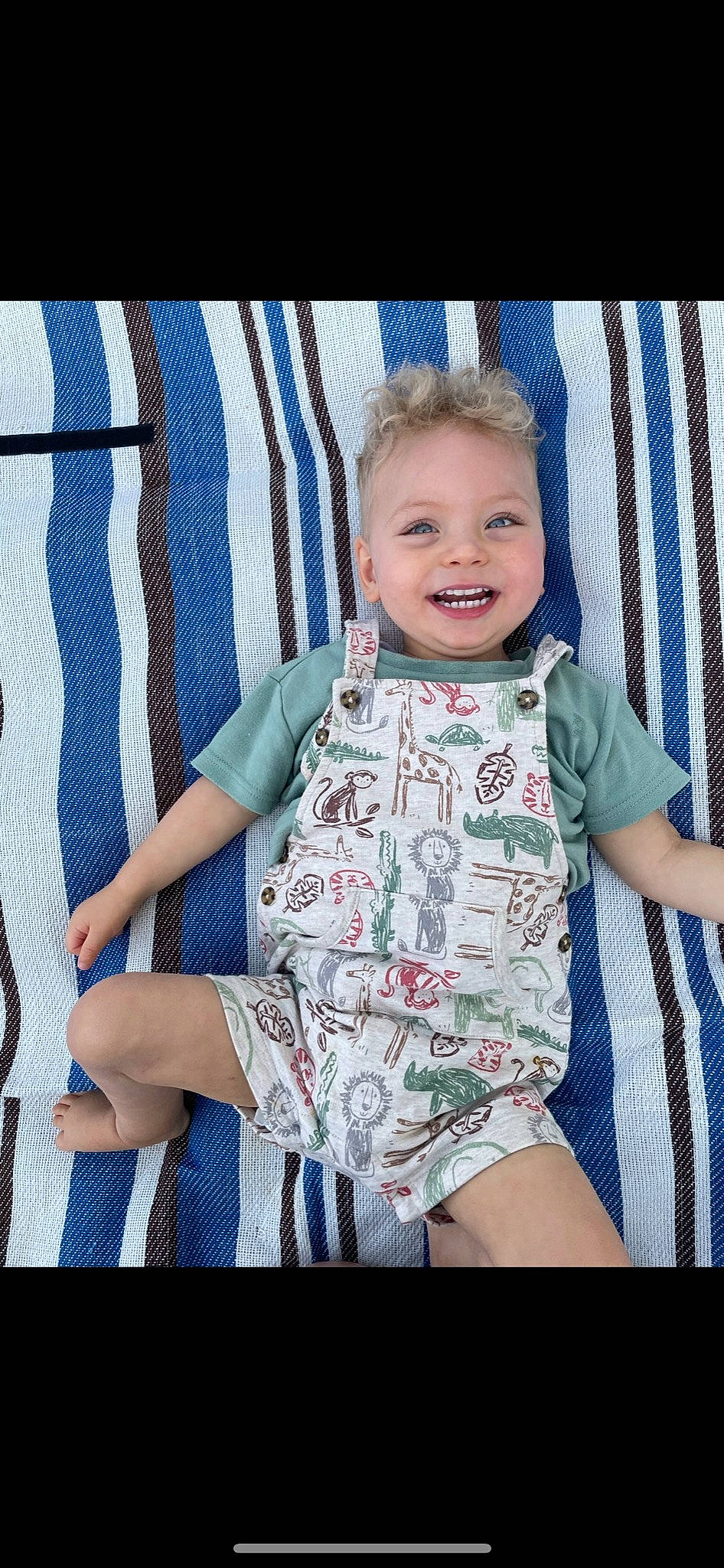 Carl joined the competition — help win amazing prizes! baby, baby_toddler_clothing, blue, chair, child, comfort, cool, electric_blue, happy, iris, joy, leg, pattern, person, sitting, skin, sleeve, smile, t_shirt, textile