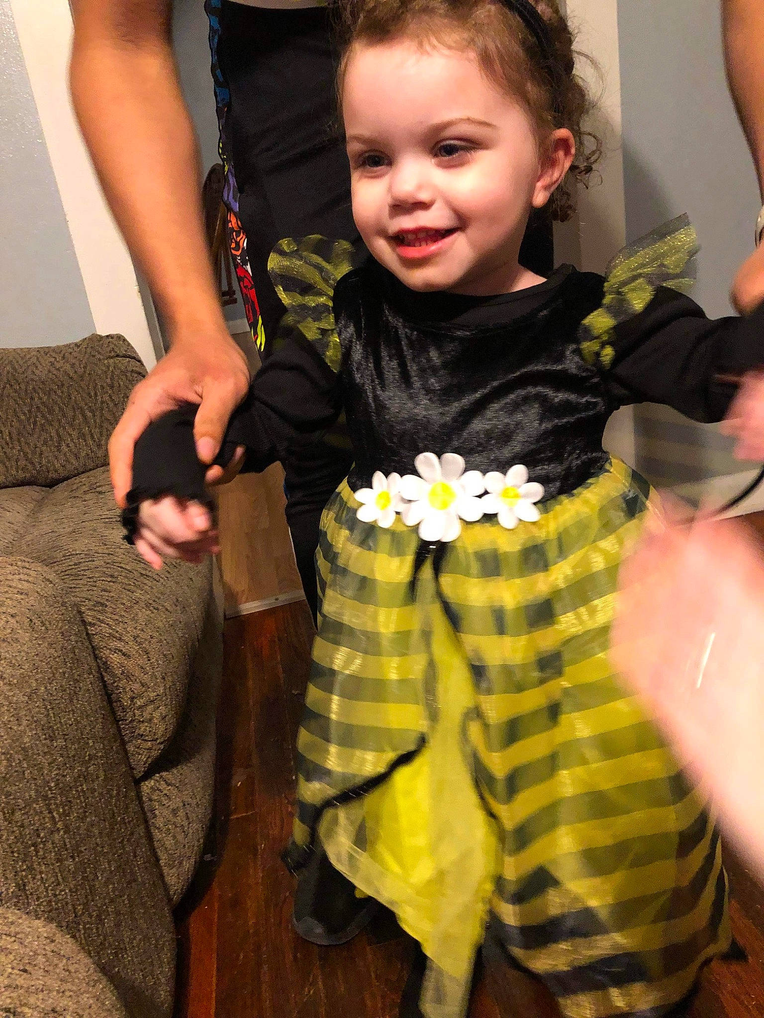 Addalyn is registered to the contest to win money with this photo: arm, baby_toddler_clothing, child, event, eye, face, fashion_accessory, finger, fun, gesture, hand, happy, iris, joy, person, sitting, skin, smile, thigh, thumb