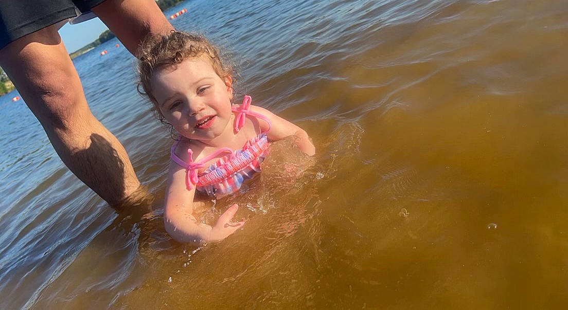 Addalyn joined the competition — help win amazing prizes! bathing, beach, chest, child, fun, hand, happy, joy, lake, leisure, ocean, people_on_beach, person, personal_protective_equipment, play, recreation, smile, swimwear, toddler, water