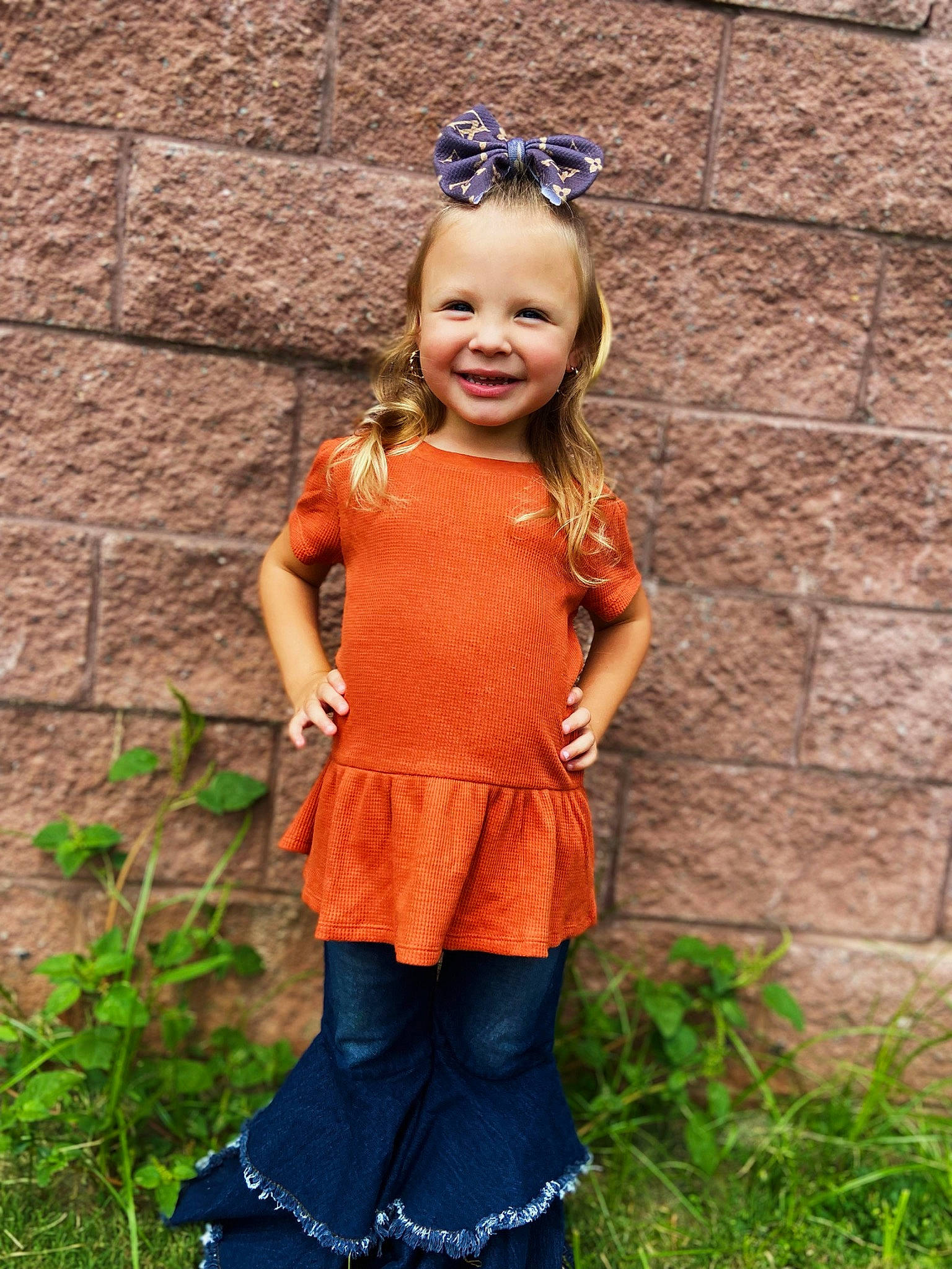 Dixie is registered to the contest to win money with this photo: brown_hair, electric_blue, eye, face, grass, hair, happy, head, human_body, human_leg, jewellery, joy, magenta, person, plant, sleeve, smile, thigh, toddler, trunk