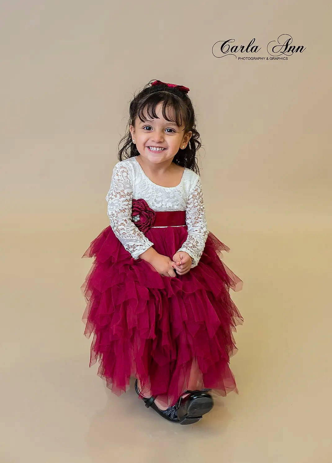 Isabella Estrada is registered to the contest to win money with this photo: baby_toddler_clothing, costume, day_dress, dress, entertainment, event, fashion_accessory, fashion_design, formal_wear, happy, joy, magenta, one_piece_garment, pattern, performing_arts, person, pink, purple, sleeve, smile
