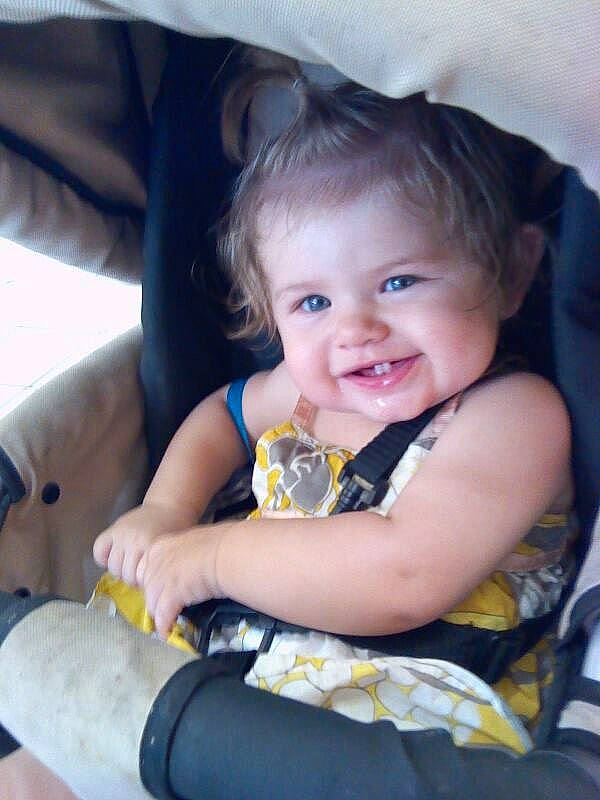 Mattie is registered to the contest to win money with this photo: baby, baby_products, car_seat, child, joy, person, product, sitting, skin, smile, toddler