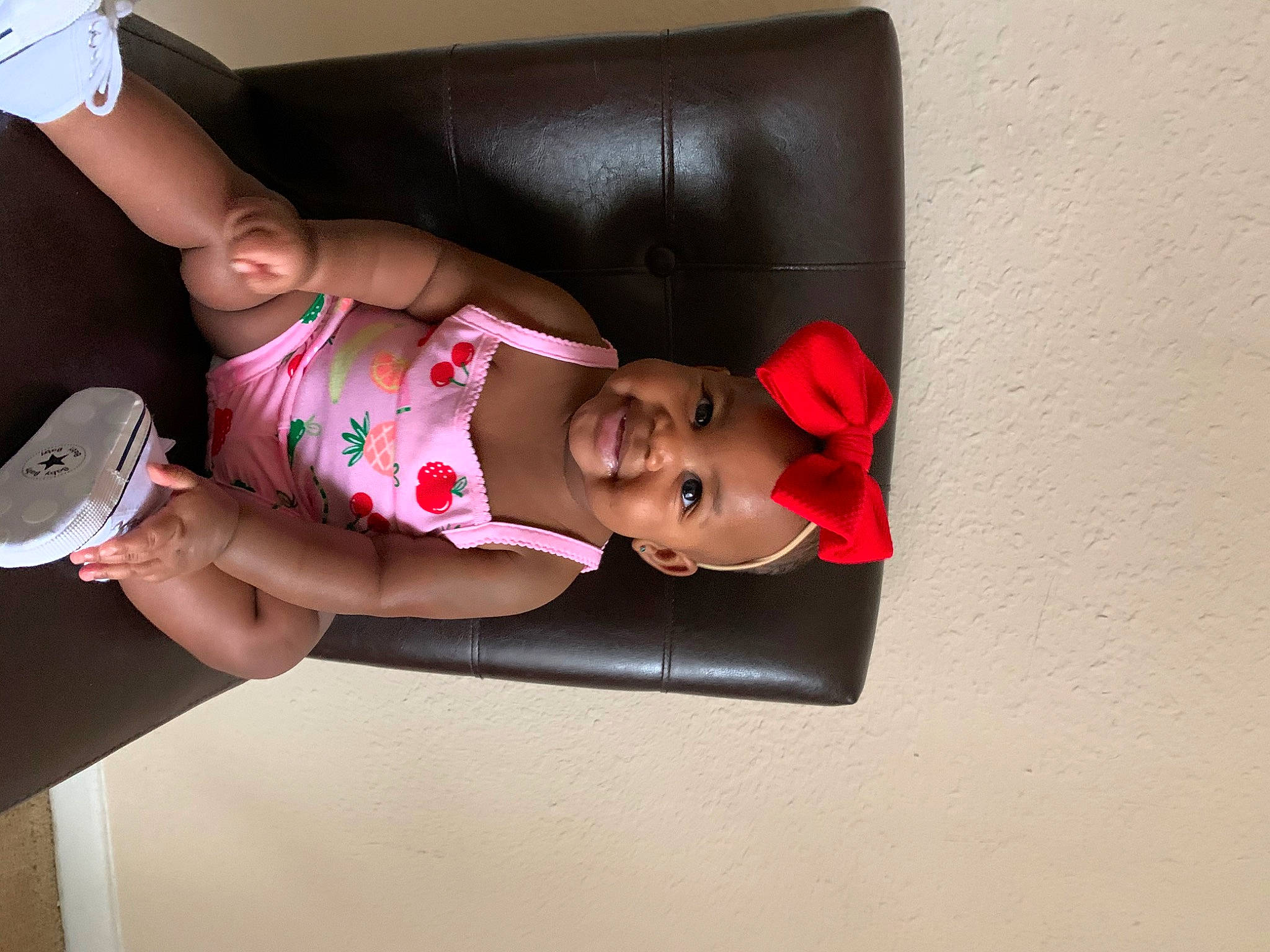 Sydney is registered to the contest to win money with this photo: arm, baby, child, elbow, joint, joy, leg, muscle, person, pink, toddler