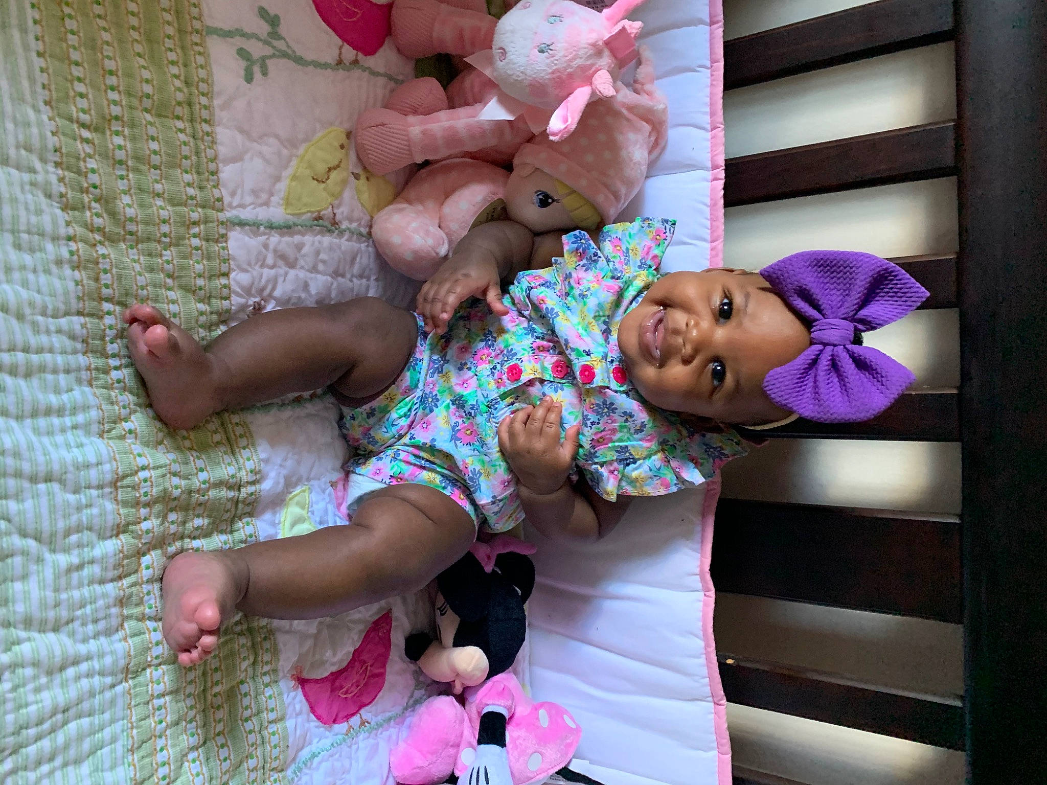Sydney is registered to the contest to win money with this photo: baby, child, headwear, joy, person, pink, room, toddler