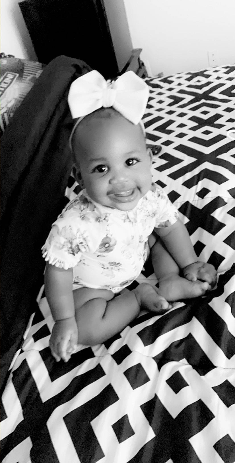 Sydney is registered to the contest to win money with this photo: baby, baby_products, baby_toddler_clothing, black_and_white, child, child_model, design, hair_accessory, headgear, joy, monochrome, monochrome_photography, pattern, person, photo_shoot, photograph, photography, product, style, toddler