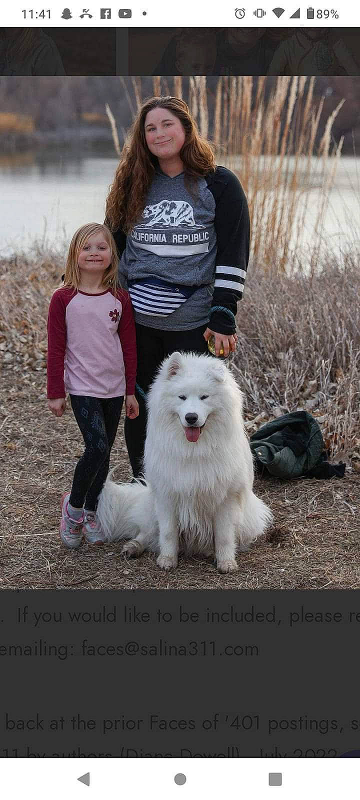 Koda is registered to the contest to win money with this photo: canidae, carnivore, companion_dog, dog, dog_breed, fun, fur, giant_dog_breed, grass, happy, herding_dog, hoodie, jeans, sitting, smile, snow, spitz, sporting_group, winter, working_dog