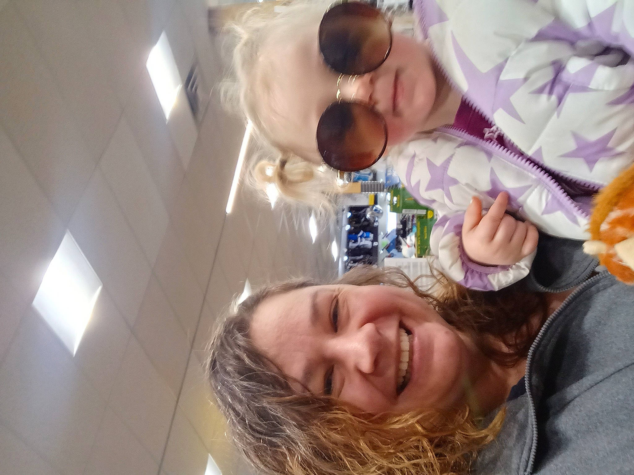 Serenity is registered to the contest to win money with this photo: child, event, eyewear, fun, goggles, grass, happy, joy, leisure, mouth, person, plant, room, selfie, smile, sunglasses, tree, vacation, vision_care