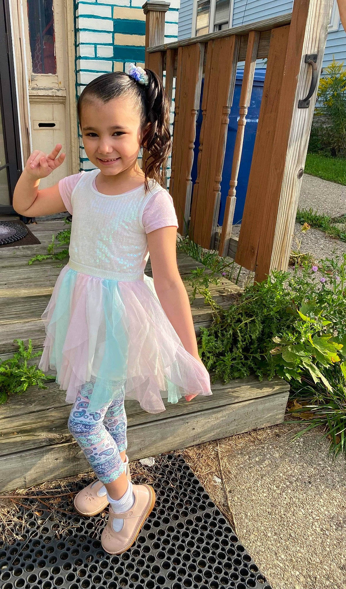 Essabella is registered to the contest to win money with this photo: baby_toddler_clothing, child, electric_blue, footwear, fun, grass, hairstyle, happy, human_body, human_leg, joy, leg, leisure, person, plant, sandal, shoe, sleeve, smile, thigh