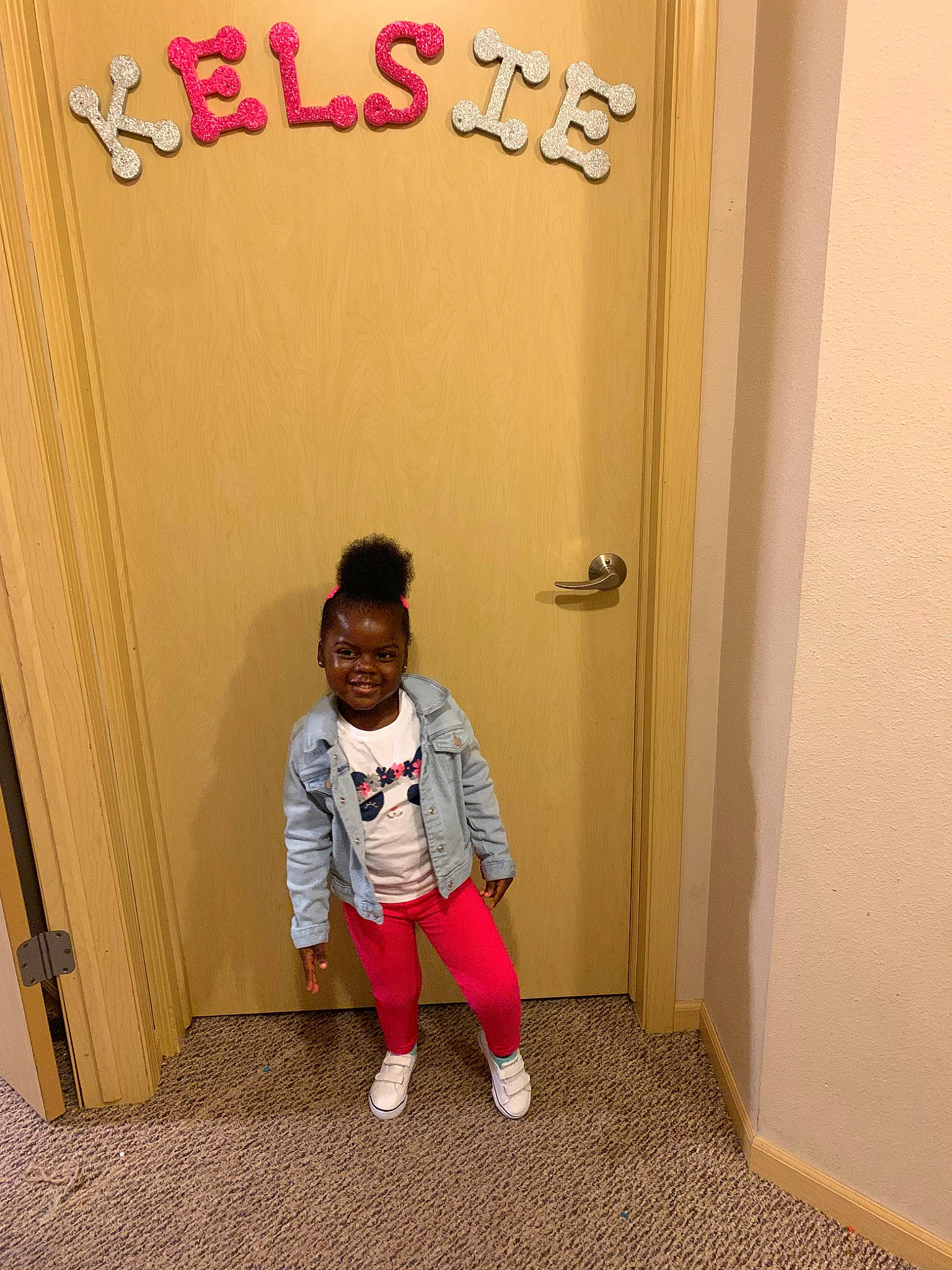 Kelsie is registered to the contest to win money with this photo: child, door, joy, person, pink, room, shoe, standing, toddler