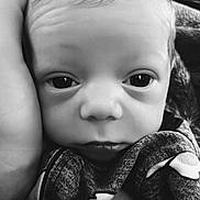 Canaan is registered to the contest to win money with this photo: baby, newborn, infant, close_up, black_and_white, face, eyes, hand, blanket, wrapped, portrait, cute, small, soft, resting, child, newborn_baby, gentle, tender, cozy