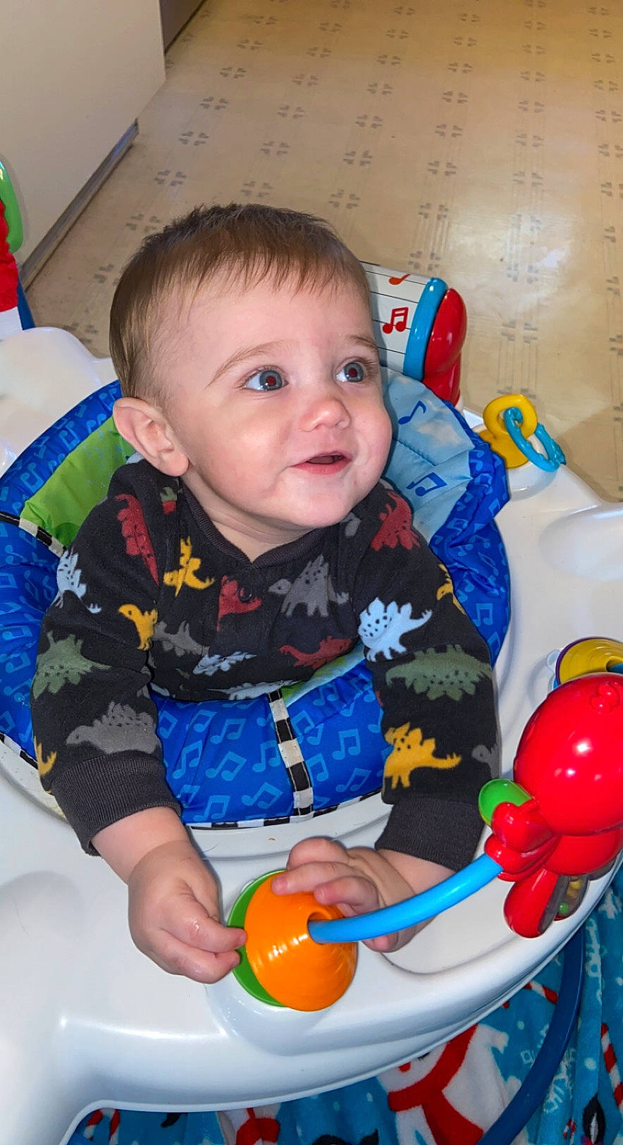 Owen joined the competition — help win amazing prizes! baby, baby_playing_with_toys, baby_products, baby_safety, baby_toddler_clothing, baby_toys, bib, child, citrus, ear, mandarin_orange, orange, overall, person, plastic, plastic_bottle, play, toddler, toy