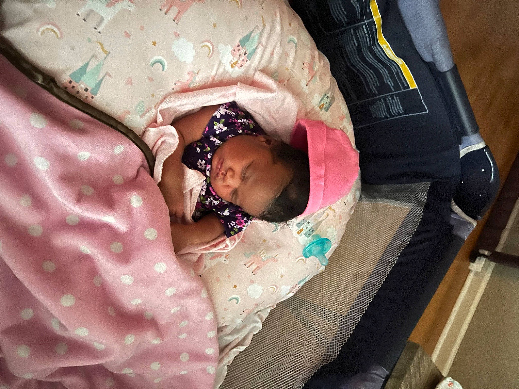 Emani is registered to the contest to win money with this photo: baby, baby_products, baby_sleeping, baby_toddler_clothing, child, comfort, linens, magenta, pattern, person, pink, product, room, sleeve, sunglasses, textile, toddler