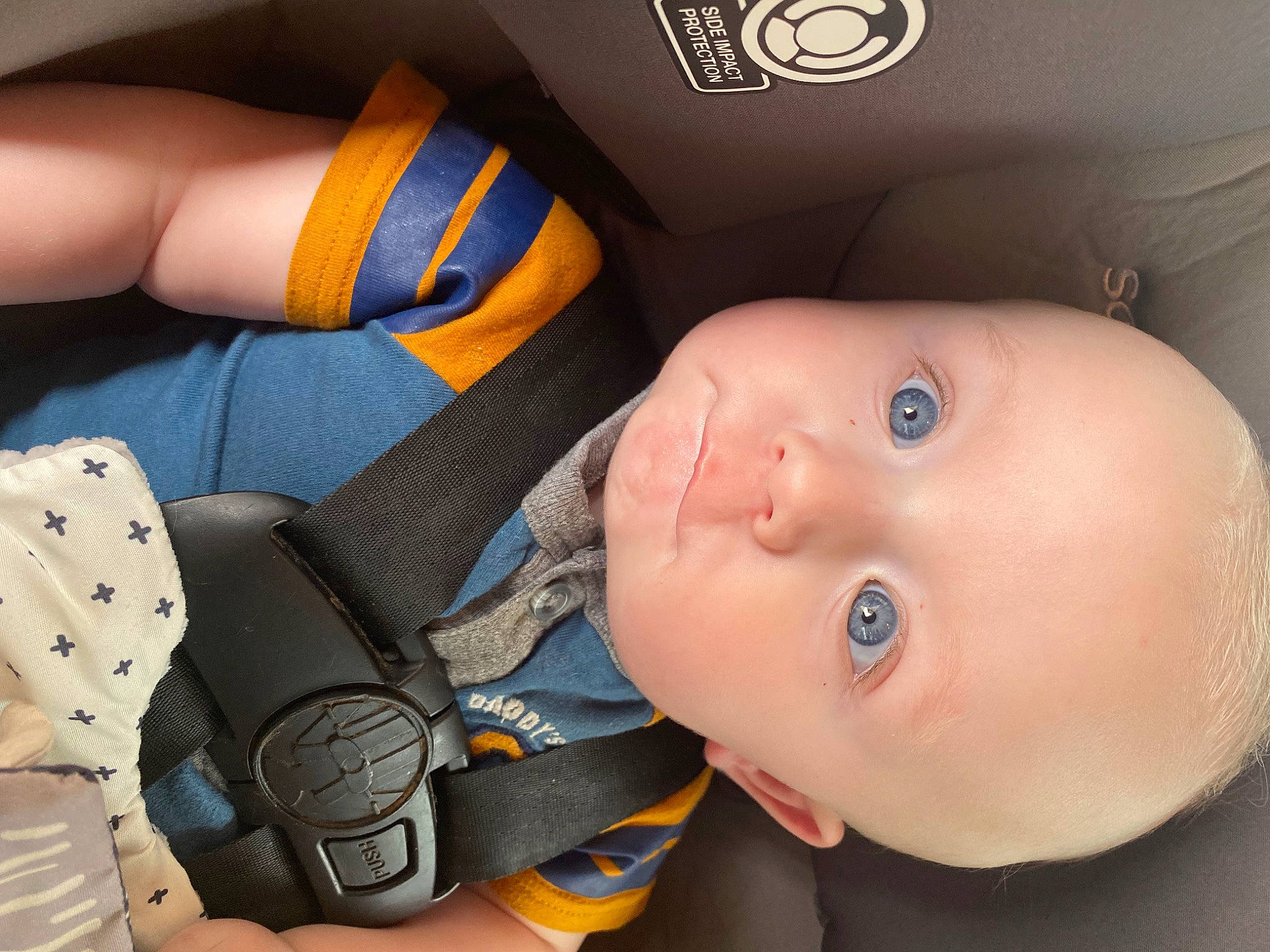 Kamdyn is registered to the contest to win money with this photo: baby, baby_in_car_seat, baby_products, baby_safety, baby_sleeping, baby_toddler_clothing, cheek, child, comfort, elbow, electric_blue, eyelash, finger, gesture, mouth, nail, nose, person, smile, thumb