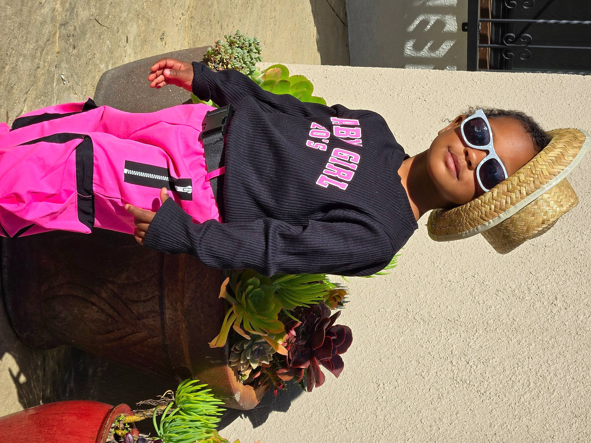 Adrina Love joined the competition — help win amazing prizes! bag, eyewear, fashion_accessory, font, goggles, green, hat, headgear, luggage_and_bags, magenta, pattern, person, personal_protective_equipment, sleeve, sportswear, sunglasses, t_shirt, top