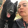 dog, black_dog, person, woman, child, outdoor, water, lake, forest, happy, tongue_out, leash, close_up, casual, nature, summer, playful, portrait, smile, fun