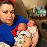 Joseph joined the competition — help win amazing prizes! baby, blanket, bottle, casual, child, couch, facial_expression, furniture, holding, home, indoor, infant, newborn, pajamas, panda, parent, person, portrait, red_hair, woman