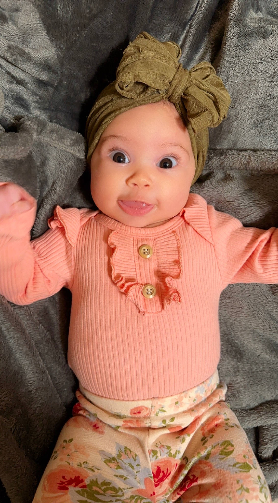 Aubree is registered to the contest to win money with this photo: baby, baby_toddler_clothing, cheek, child, chin, doll, dress, eye, face, forehead, head, headwear, human_body, iris, lip, nose, organ, person, pink, skin