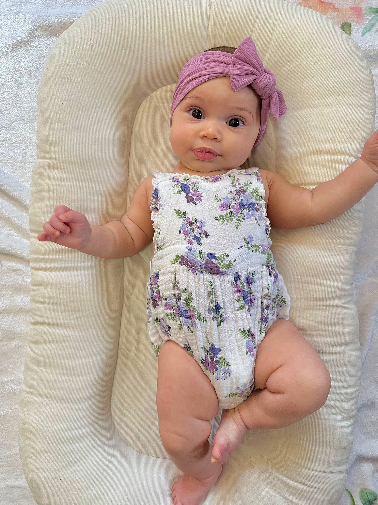 Aubree is registered to the contest to win money with this photo: baby_toddler_clothing, chest, comfort, doll, dress, embellishment, eye, eyelash, finger, hand, headwear, human_leg, iris, pattern, person, pink, purple, skin, sleeve, thigh