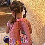 backpack, bicycles, child, clothing, cute, embroidery, flowers, girl, hair, outdoor, person, pigtails, pink, ribbons, shadow, sunlight, texture, tiles, wall, water_bottle