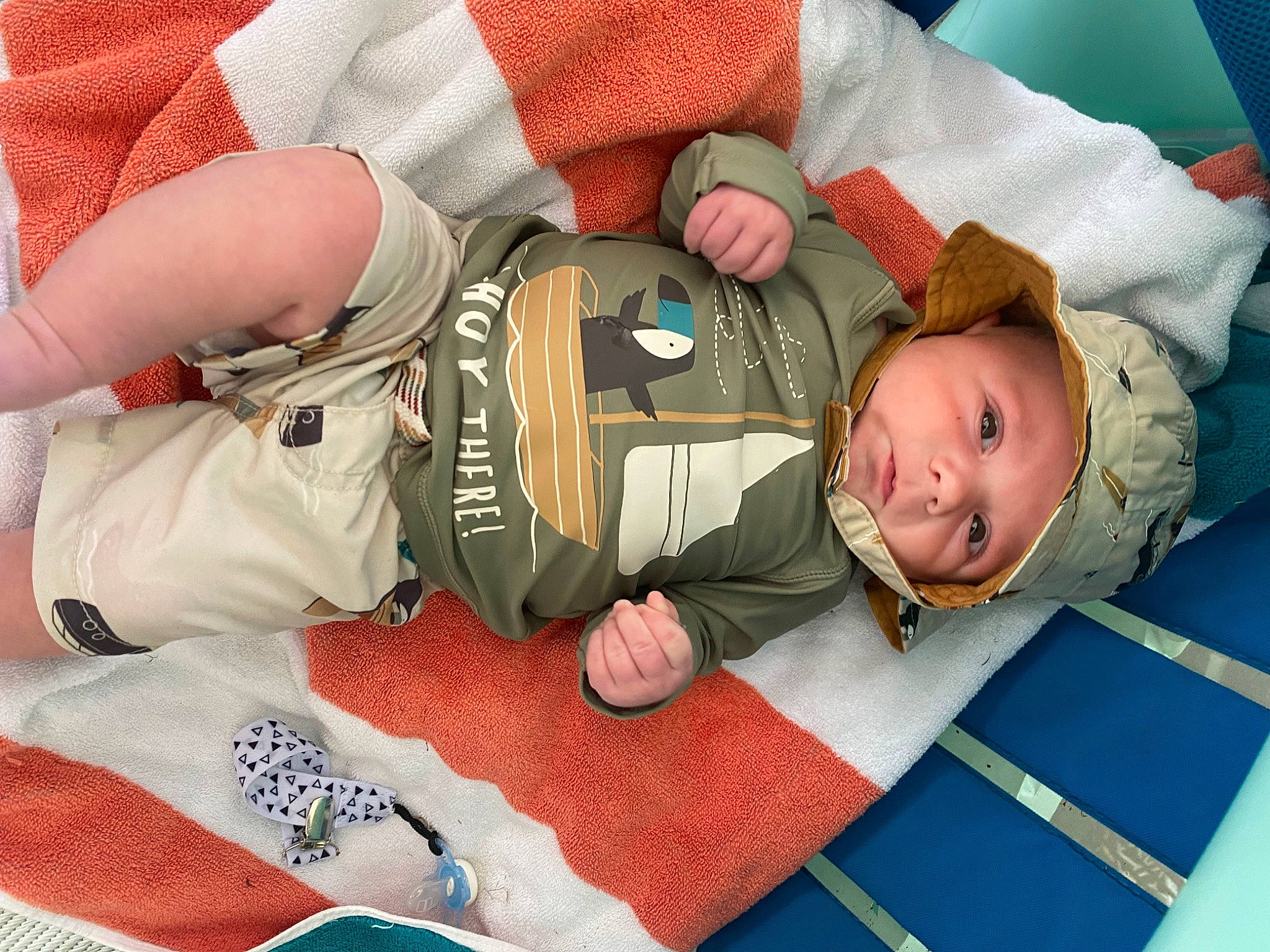 Weston is registered to the contest to win money with this photo: baby, baby_products, baby_sleeping, baby_toddler_clothing, child, comfort, elbow, gesture, headwear, linens, pattern, person, room, sitting, sleep, smile, strap, toddler, wrist