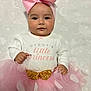 baby, child, pink_bow, tutu_skirt, white_blanket, stars, moons, cute, smile, portrait, infant, dress, headband, seated, soft_texture, adorable, clothing, hands, face, happy