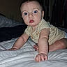 Aryez is registered to the contest to win money with this photo: baby, child, infant, crawling, bed, blanket, bedroom, portrait, face, blue_eyes, wide_eyed, surprised, looking_at_camera, short_hair, onesie, indoor, home, furniture, bedding, adorable