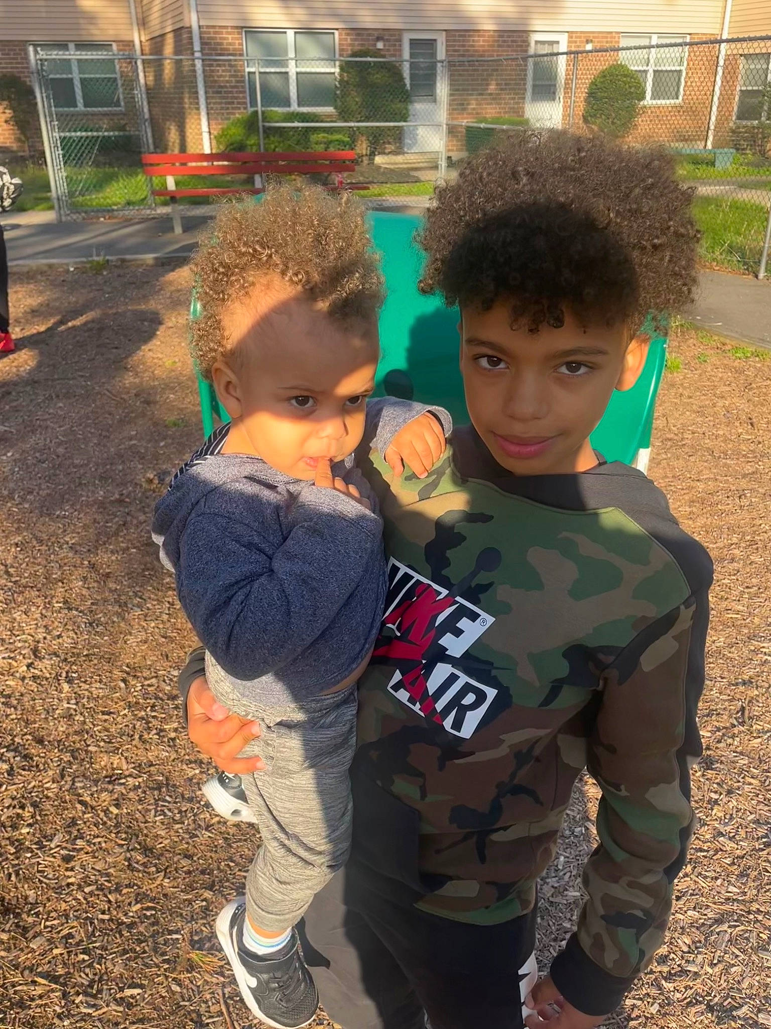 Dreytonn is registered to the contest to win money with this photo: baby, child, cool, fun, garden, grass, hairstyle, happy, landscape, leisure, military_camouflage, people_in_nature, person, plant, play, recreation, sleeve, soil, t_shirt, toddler