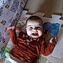 Hanaé participe au concours pour gagner de l'argent avec cette photo : baby, child, diaper, smiling, happy, play_mat, indoor, clothing, pattern, floor, person, cute, infant, joy, waving, bambi, shirt, colorful, toy, playtime